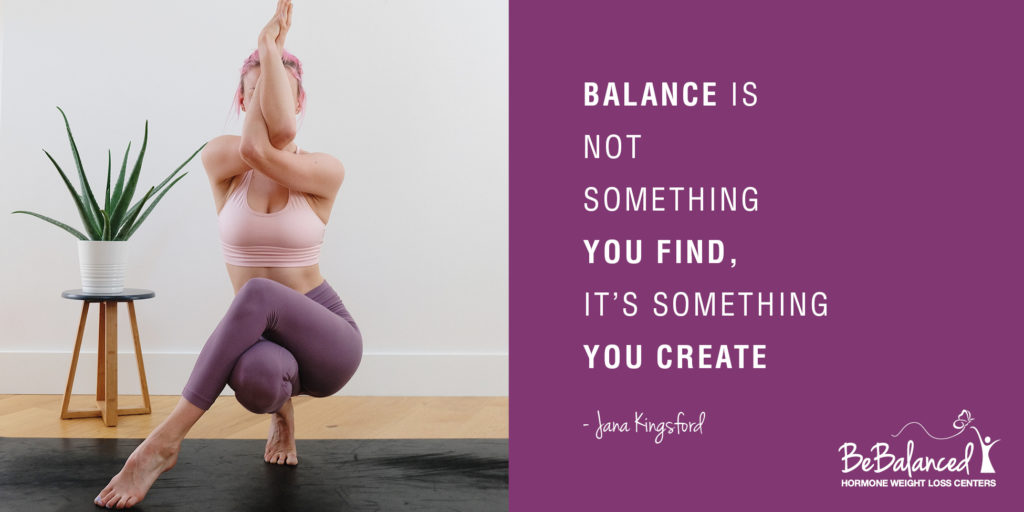 woman balances with yoga pose and balance quote