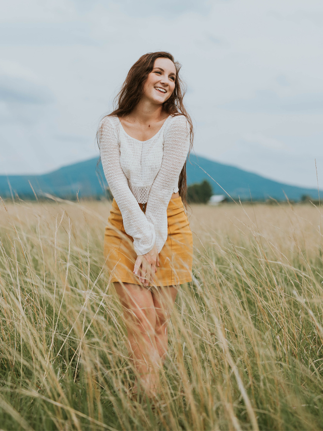 Girl standing in field Cover Photo of 12 Ways To Naturally Reverse PCOS